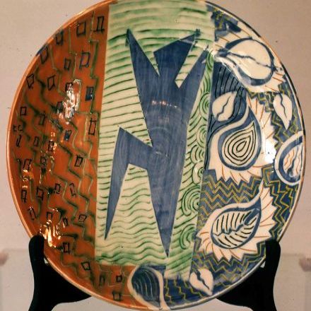 "Dancer Plate" 12 " across - clear glaze over coloured slips -  sgraffito